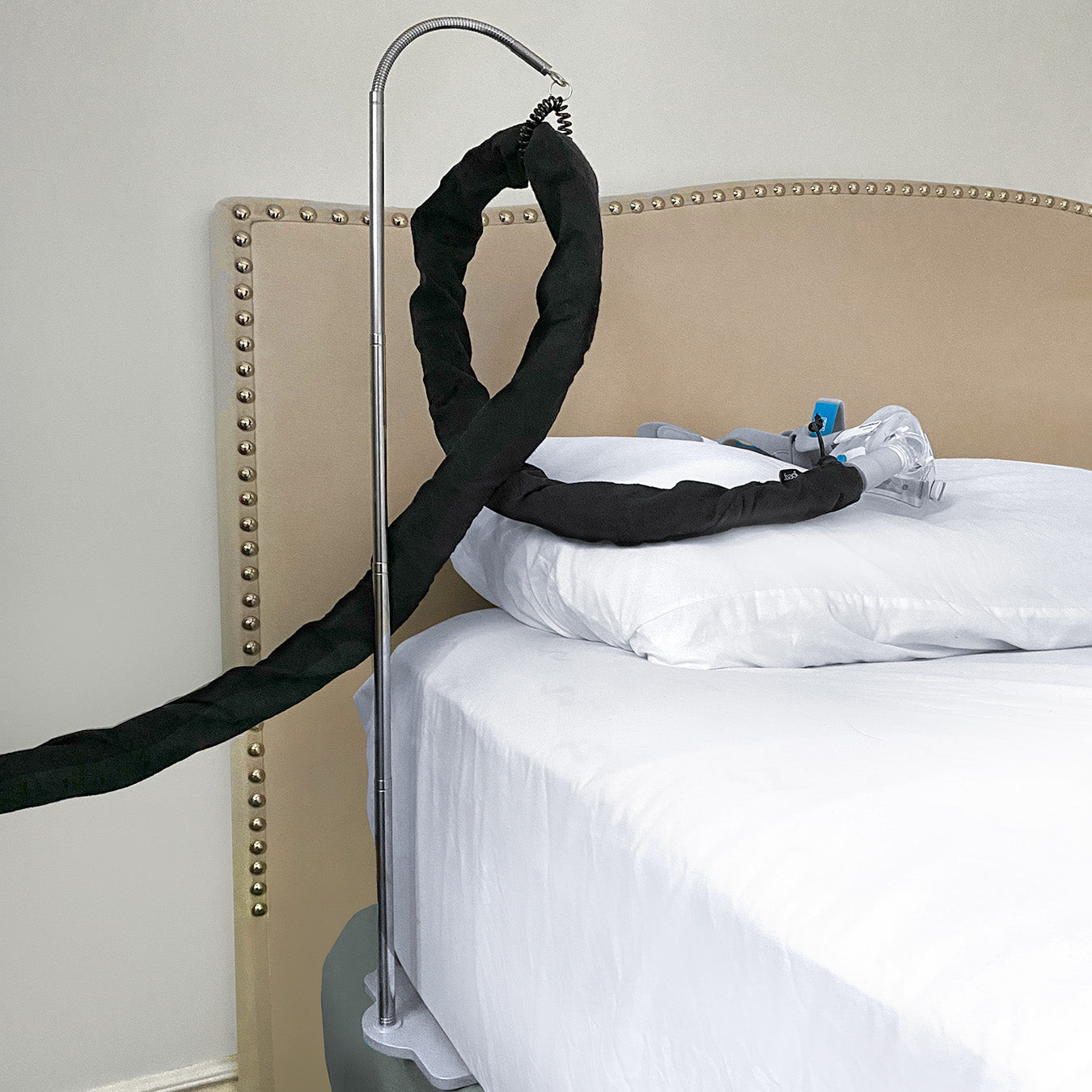 CPAPology Houdini CPAP Hose Support System shown in use with the Joey CPAP Hose Cover
