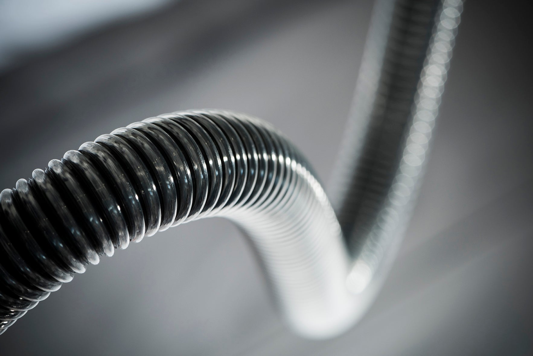 Close-up of a coiled CPAP tube on a blurred background