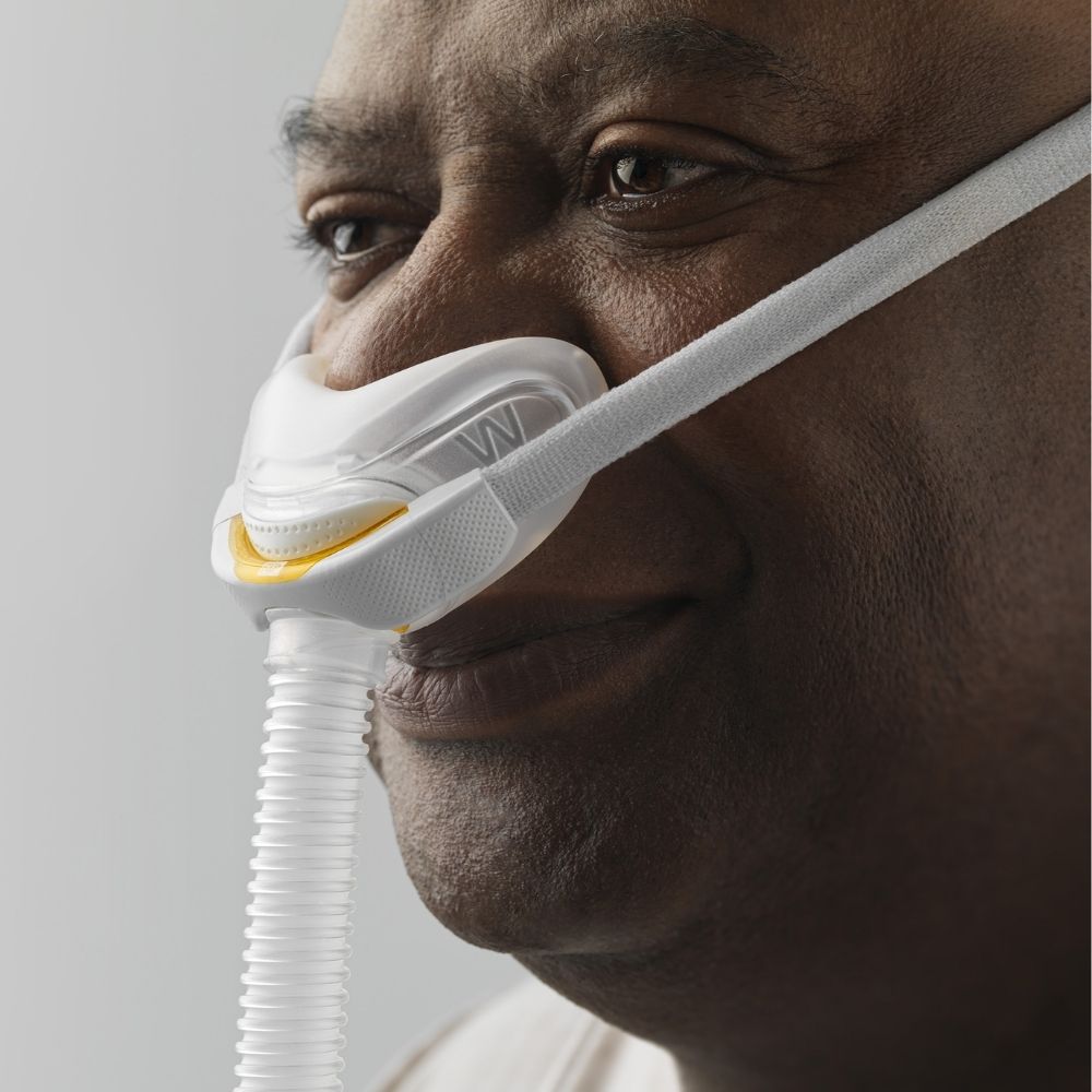 F&P Solo Nasal Mask with tube on face