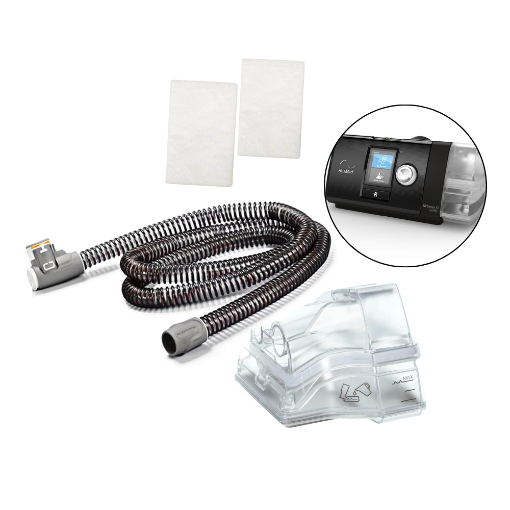 Resmed heated hose,  2 filters, Airsense 10 machine and water tank on a white background