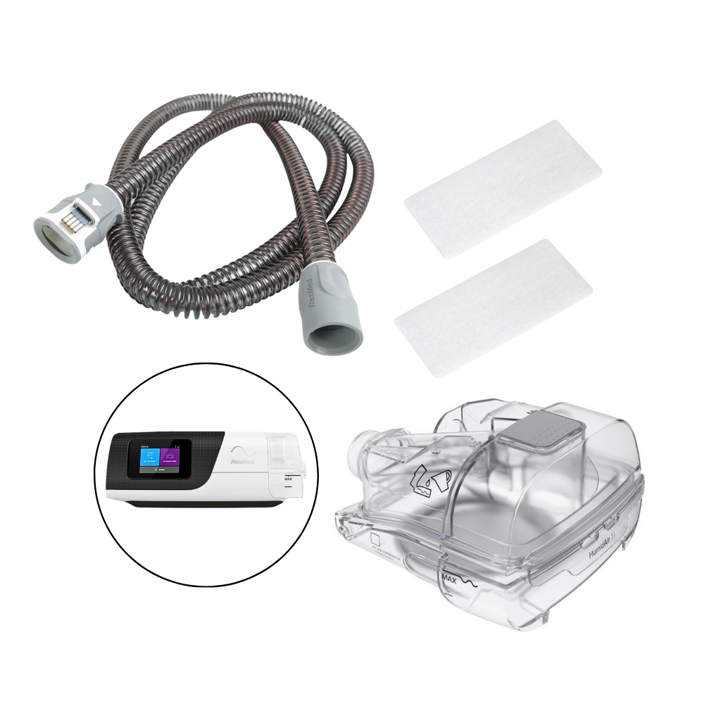 Resmed heated hose,  2 filters, Airsense 11 machine and water tank on a white background