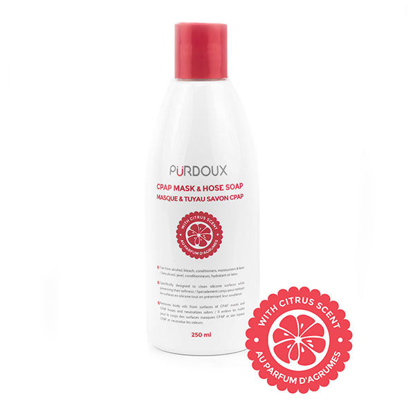 Purdoux soap bottle with red cap and citrus scent label