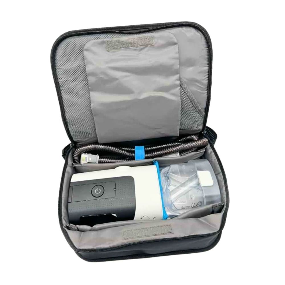 AirSense 11 CPAP Machine in a travel bag with the HumidAir 11 Water Tub and ClimateLineAir 11 Heated Tube