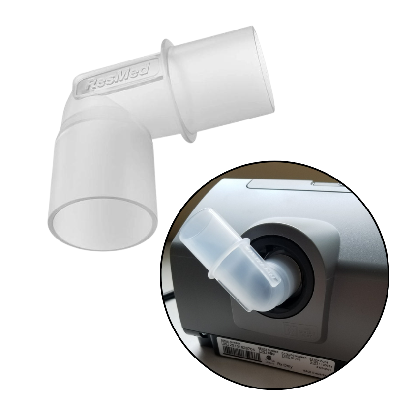 White ResMed tubing elbow with close-up of where the tube attaches to the machine