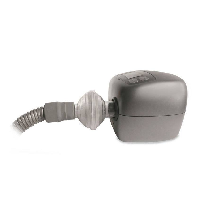 The clear Philips in-line bacteria filter shown attached to a CPAP machine on one end and a CPAP tube on the other