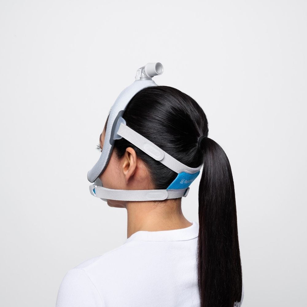 Person with a ponytail wearing the AirTouch F30i full face mask